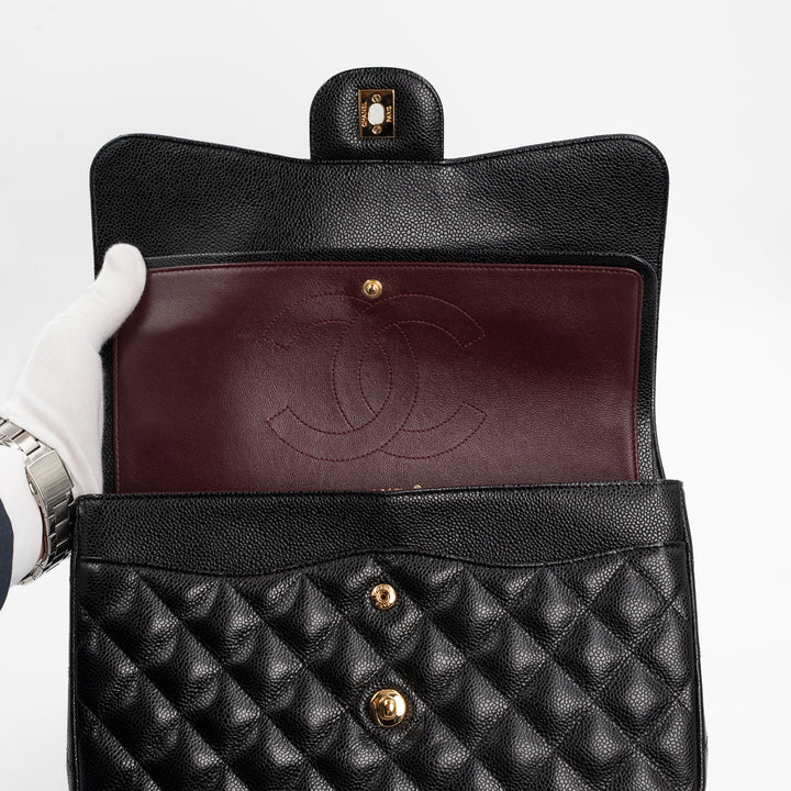 Chanel Large Classic Double Flap Bag in Black Caviar Leather with Gold Hardware