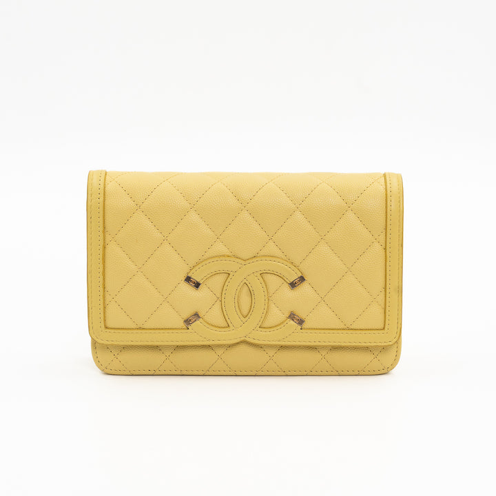 Chanel CC Filigree Wallet on Chain (WOC) in Yellow Quilted Caviar Leather with Gold Hardware
