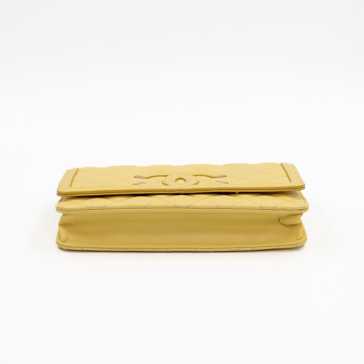 Chanel CC Filigree Wallet on Chain (WOC) in Yellow Quilted Caviar Leather with Gold Hardware