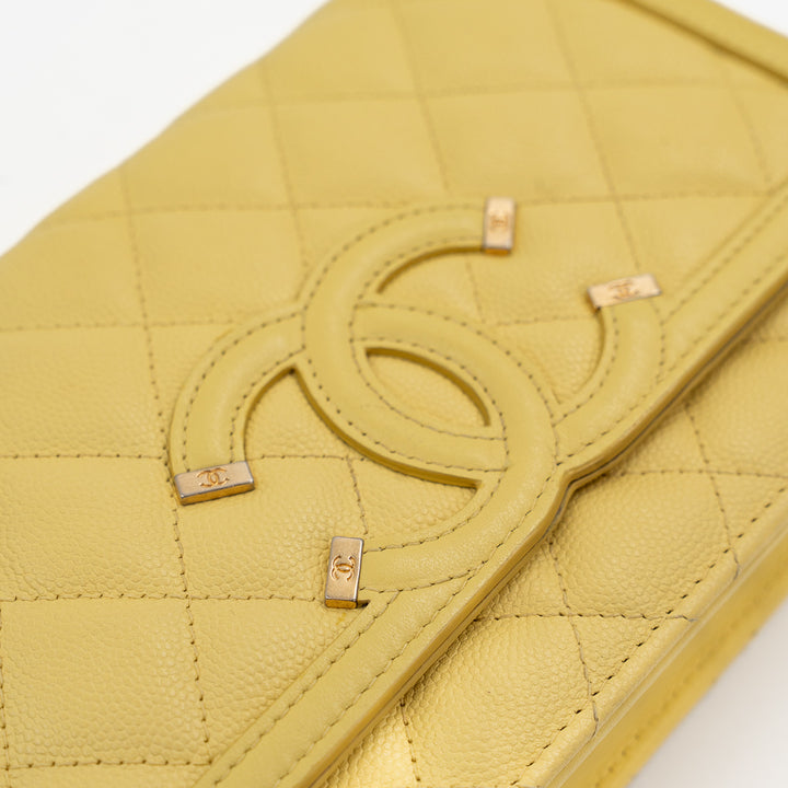 Chanel CC Filigree Wallet on Chain (WOC) in Yellow Quilted Caviar Leather with Gold Hardware