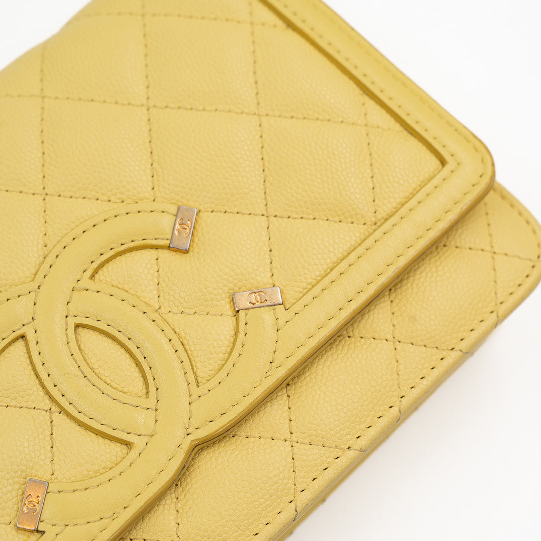 Chanel CC Filigree Wallet on Chain (WOC) in Yellow Quilted Caviar Leather with Gold Hardware