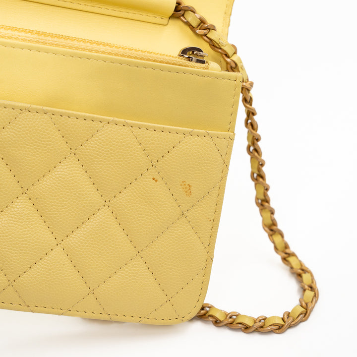 Chanel CC Filigree Wallet on Chain (WOC) in Yellow Quilted Caviar Leather with Gold Hardware
