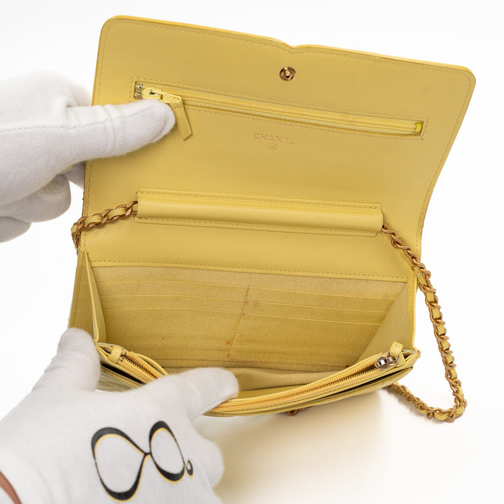 Chanel CC Filigree Wallet on Chain (WOC) in Yellow Quilted Caviar Leather with Gold Hardware