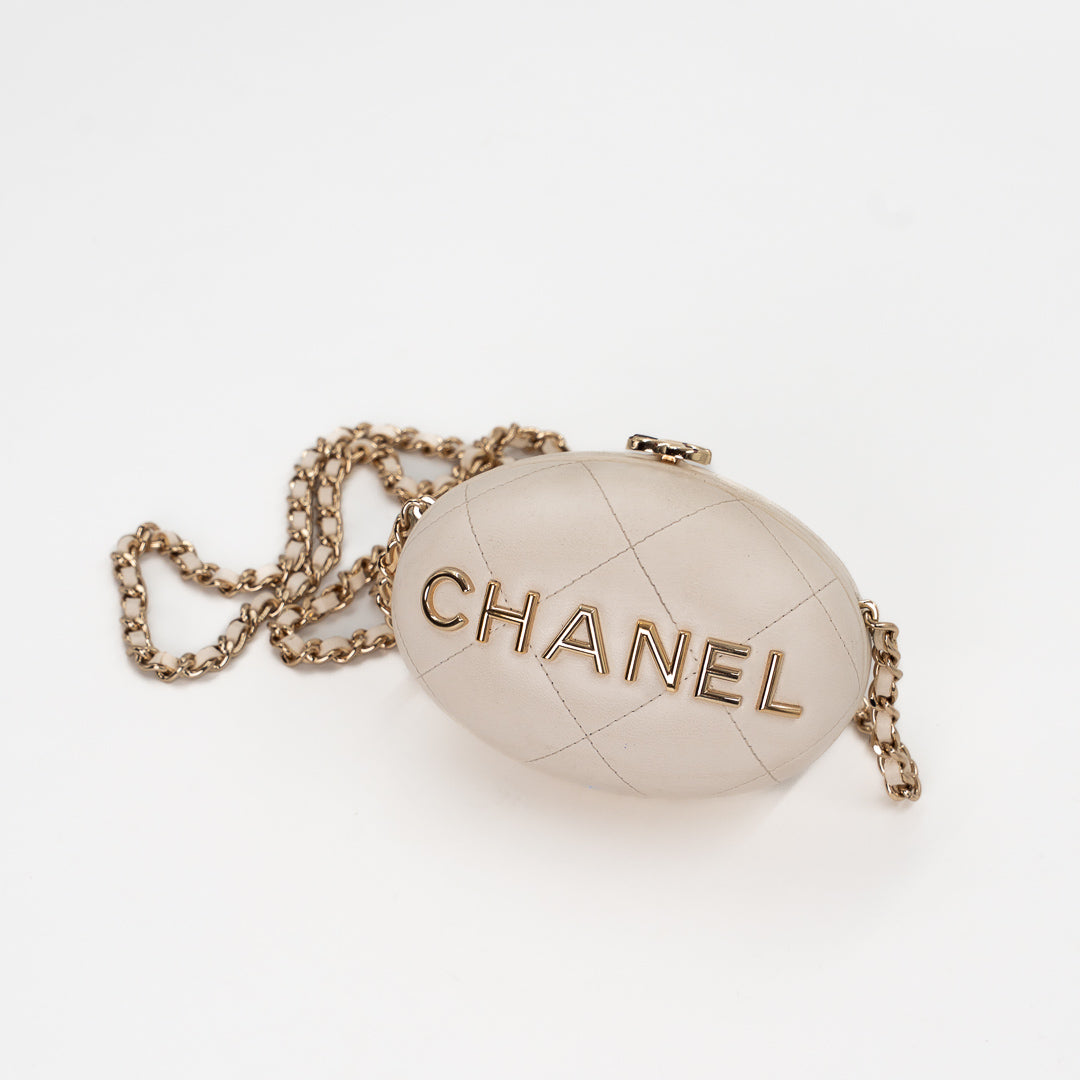Chanel Mini Bag Charm in Cream Quilted Lambskin Leather with Gold Tone Lettering