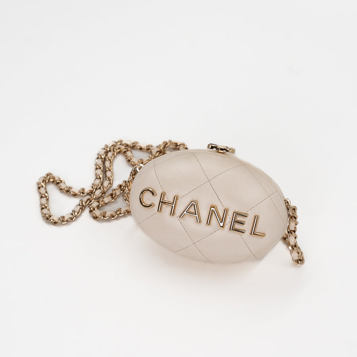 Chanel Mini Bag Charm in Cream Quilted Lambskin Leather with Gold Tone Lettering