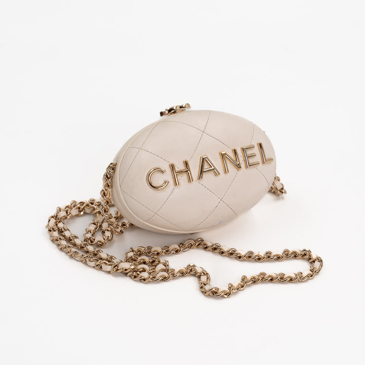 Chanel Mini Bag Charm in Cream Quilted Lambskin Leather with Gold Tone Lettering
