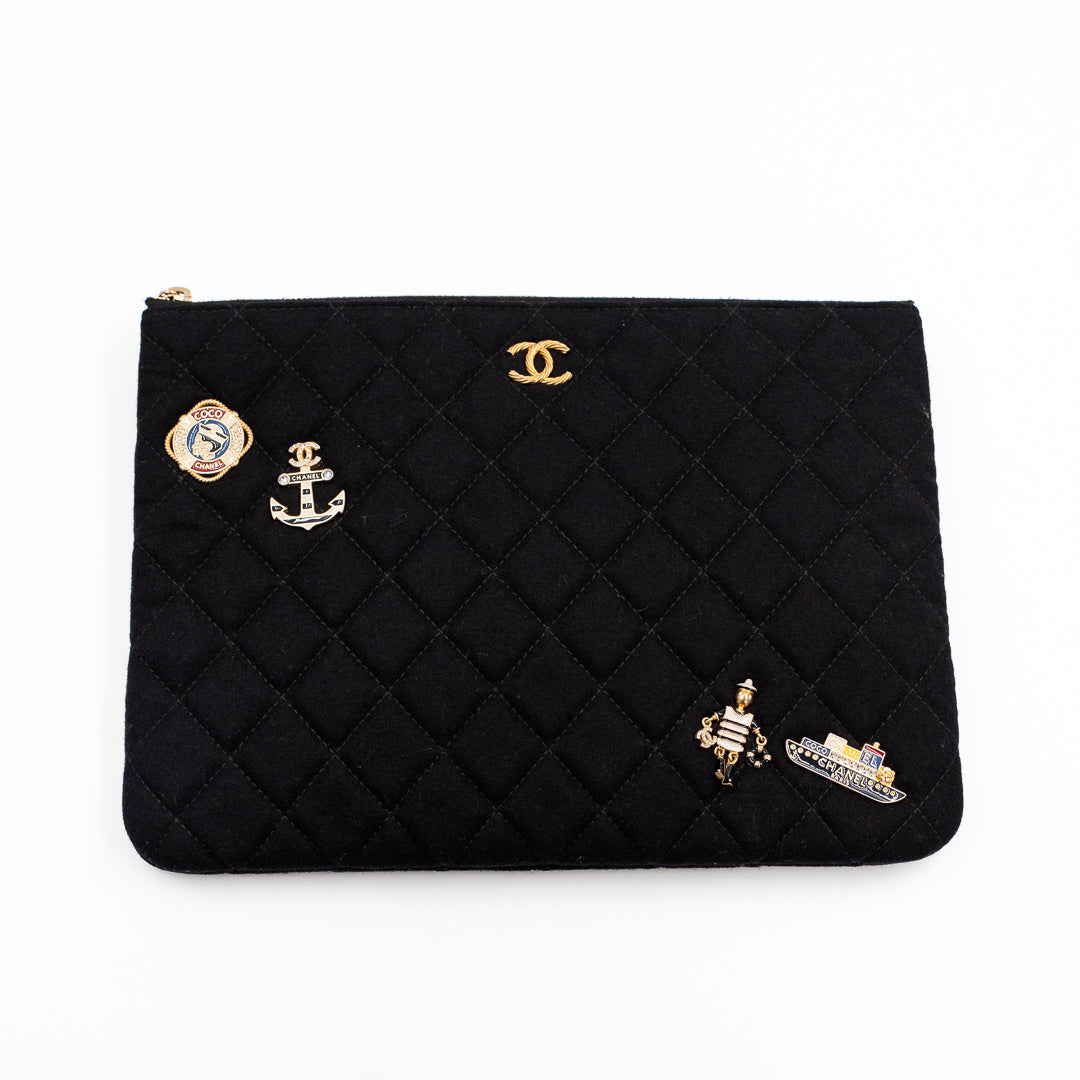 Chanel Vintage Black Quilted Wool O Case Clutch with Coco Sailor Charms & Gold Hardware