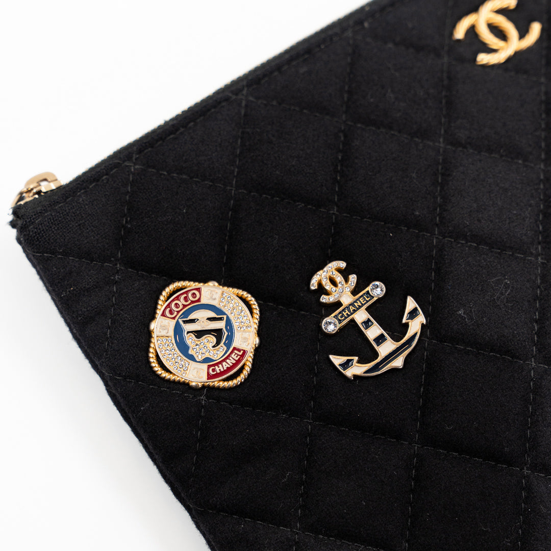 Chanel Vintage Black Quilted Wool O Case Clutch with Coco Sailor Charms & Gold Hardware