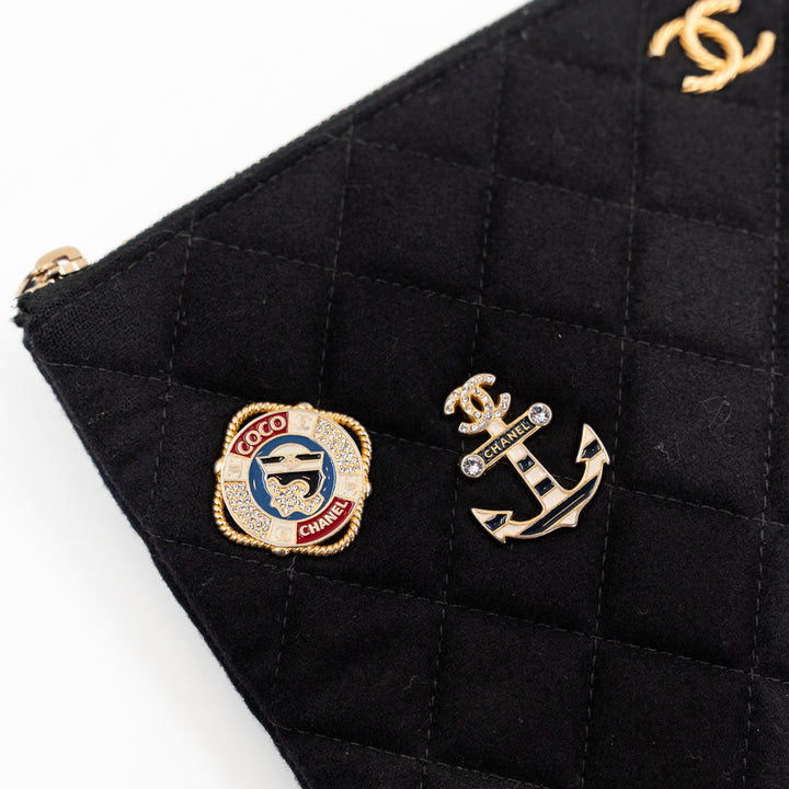 Chanel Vintage Black Quilted Wool O Case Clutch with Coco Sailor Charms & Gold Hardware