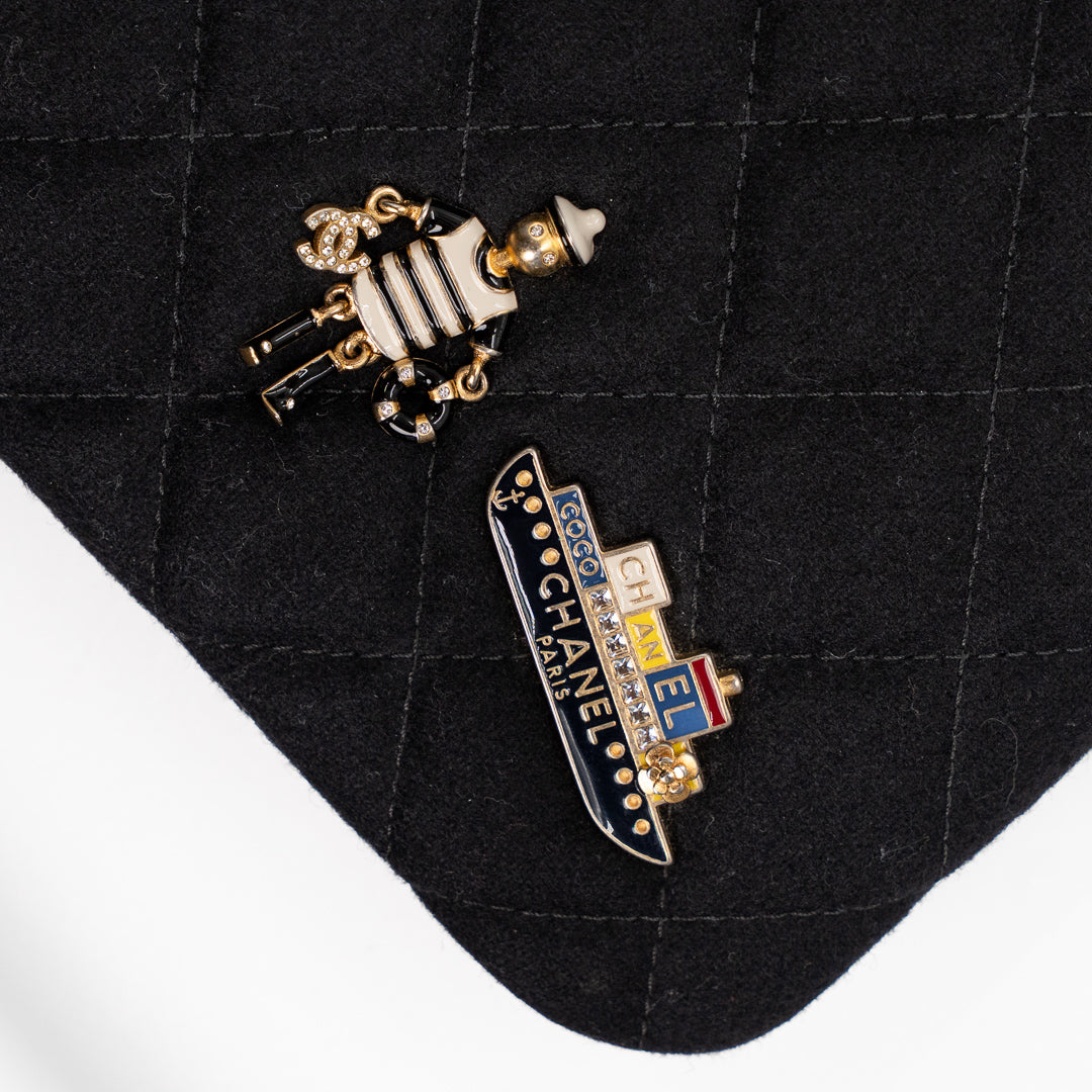 Chanel Vintage Black Quilted Wool O Case Clutch with Coco Sailor Charms & Gold Hardware