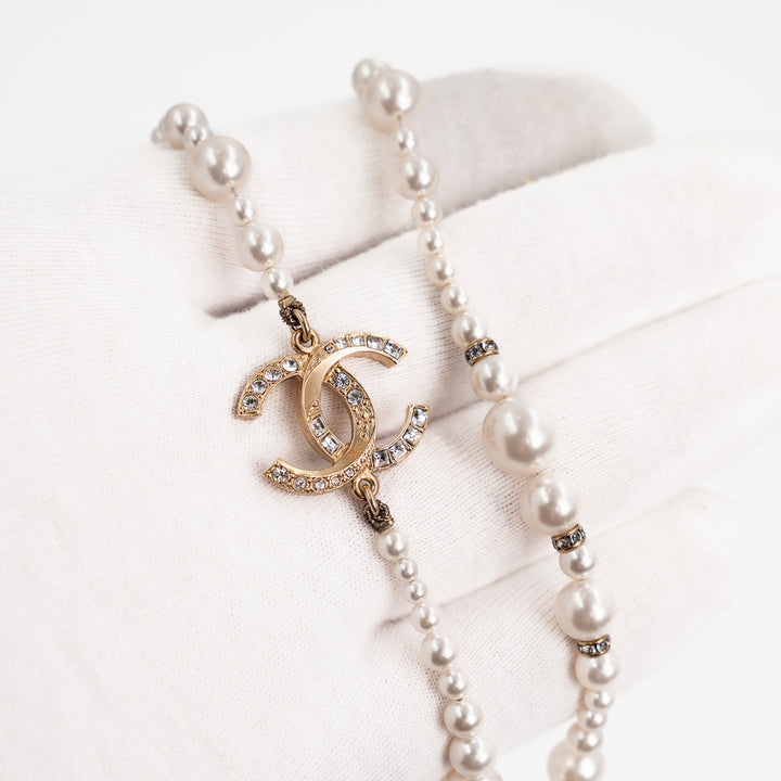 Chanel A19V Pearl CC Long Necklace in Gold Tone Metal & White Faux Pearls