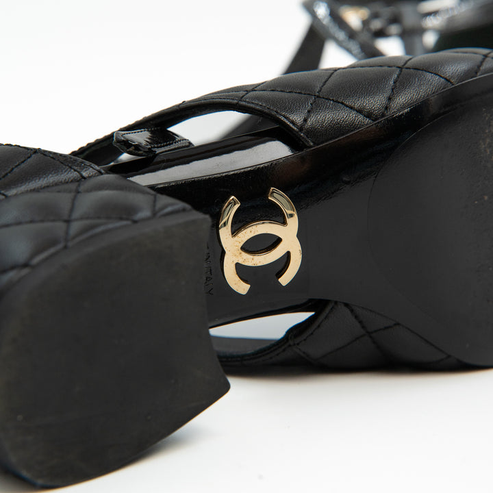 Chanel D'Orsay Pumps in Black Leather with Interlocking CC Logo