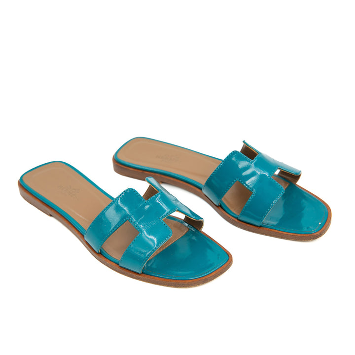 Hermès Oran Flat Slides in Teal Patent Patent Leather