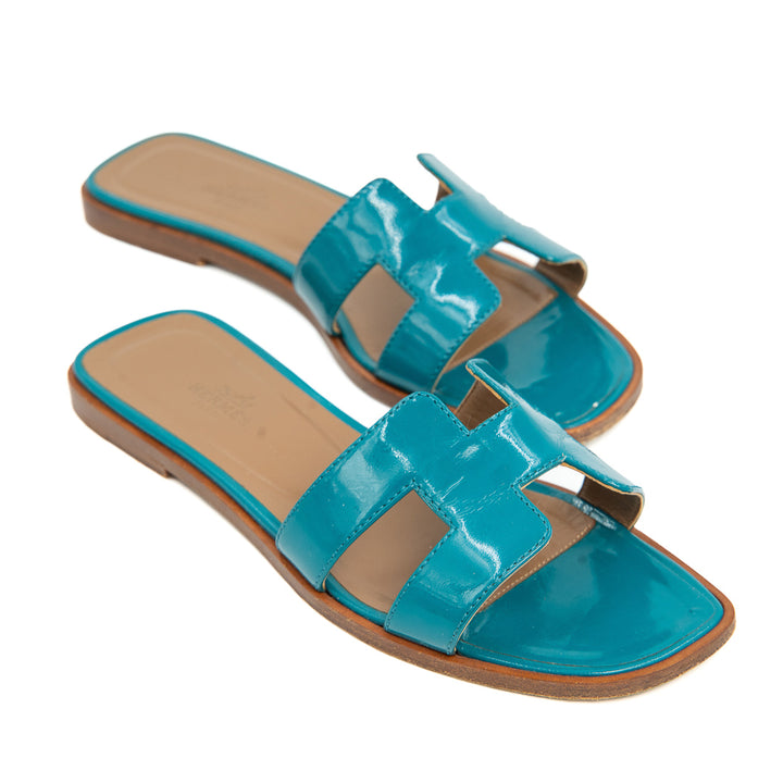 Hermès Oran Flat Slides in Teal Patent Patent Leather