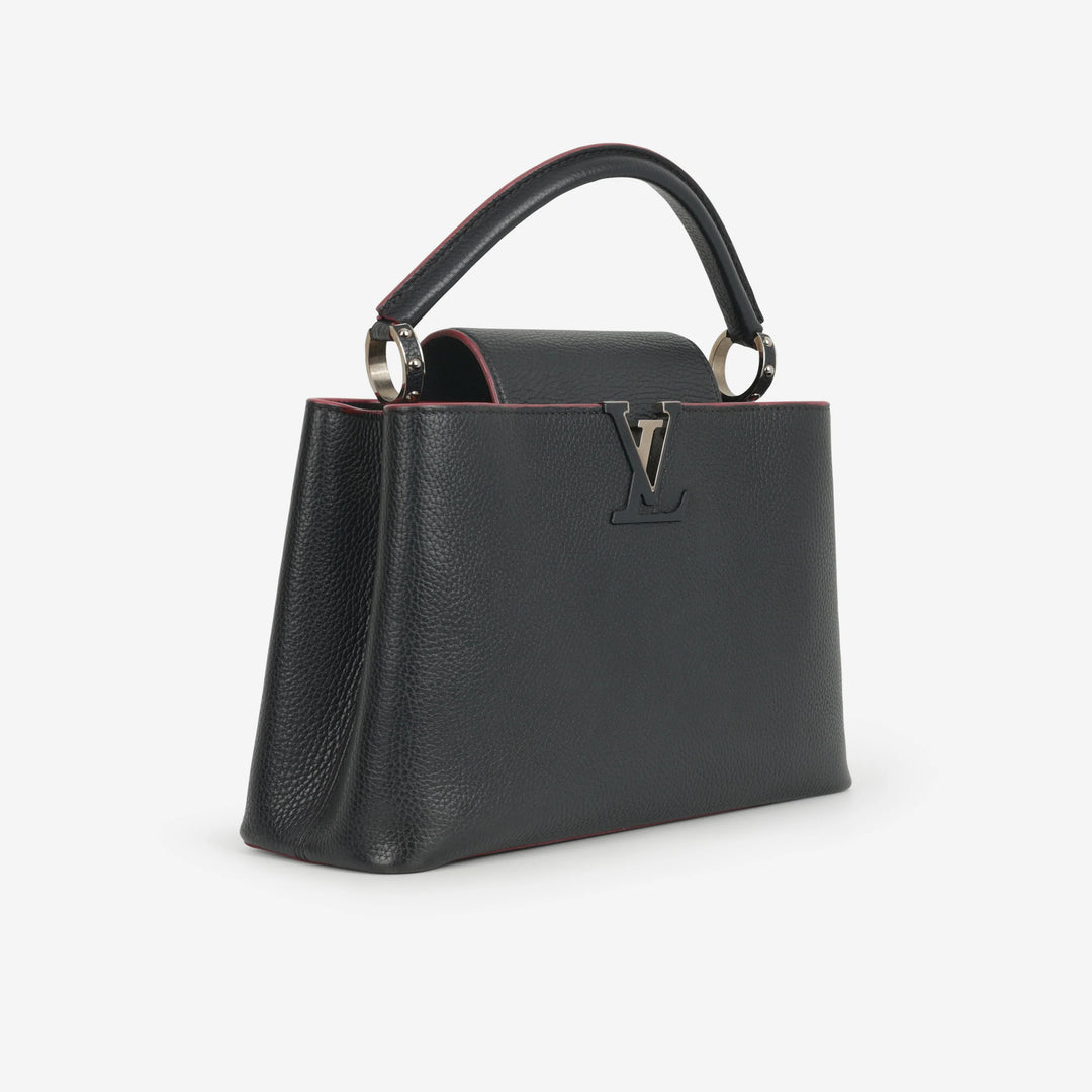 Louis Vuitton Capucines MM in Black Taurillon Leather with Pink Trim and Silver-Tone Hardware