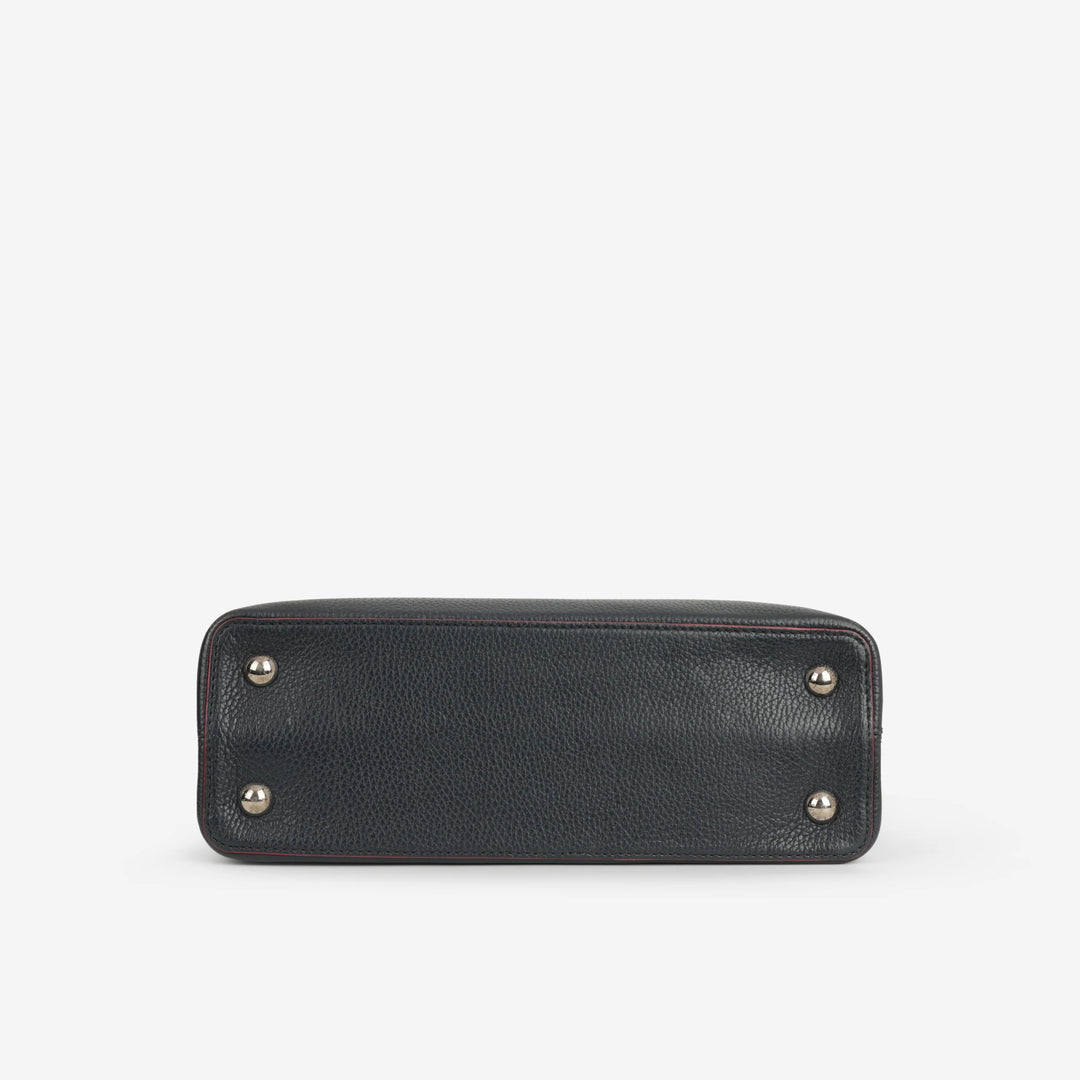 Louis Vuitton Capucines MM in Black Taurillon Leather with Pink Trim and Silver-Tone Hardware
