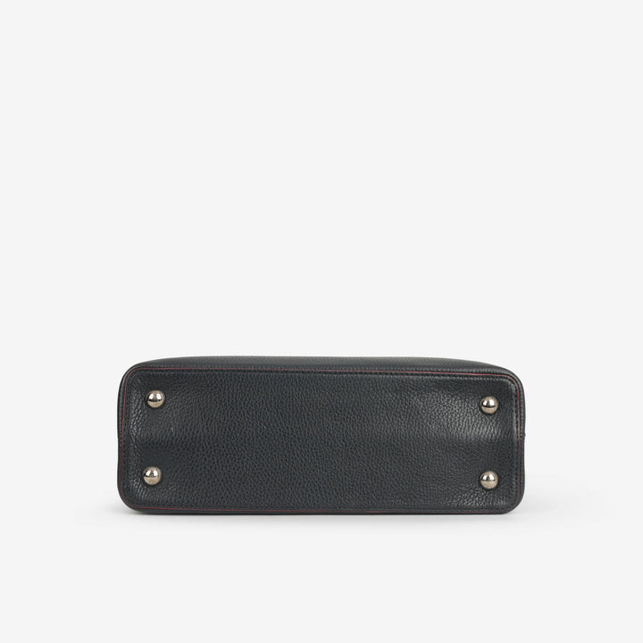 Louis Vuitton Capucines MM in Black Taurillon Leather with Pink Trim and Silver-Tone Hardware