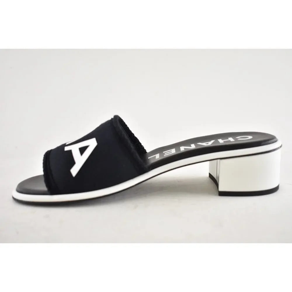 Chanel 24C Black & White CHA NEL Letter Logo Mule Slide Block Heel Sandals