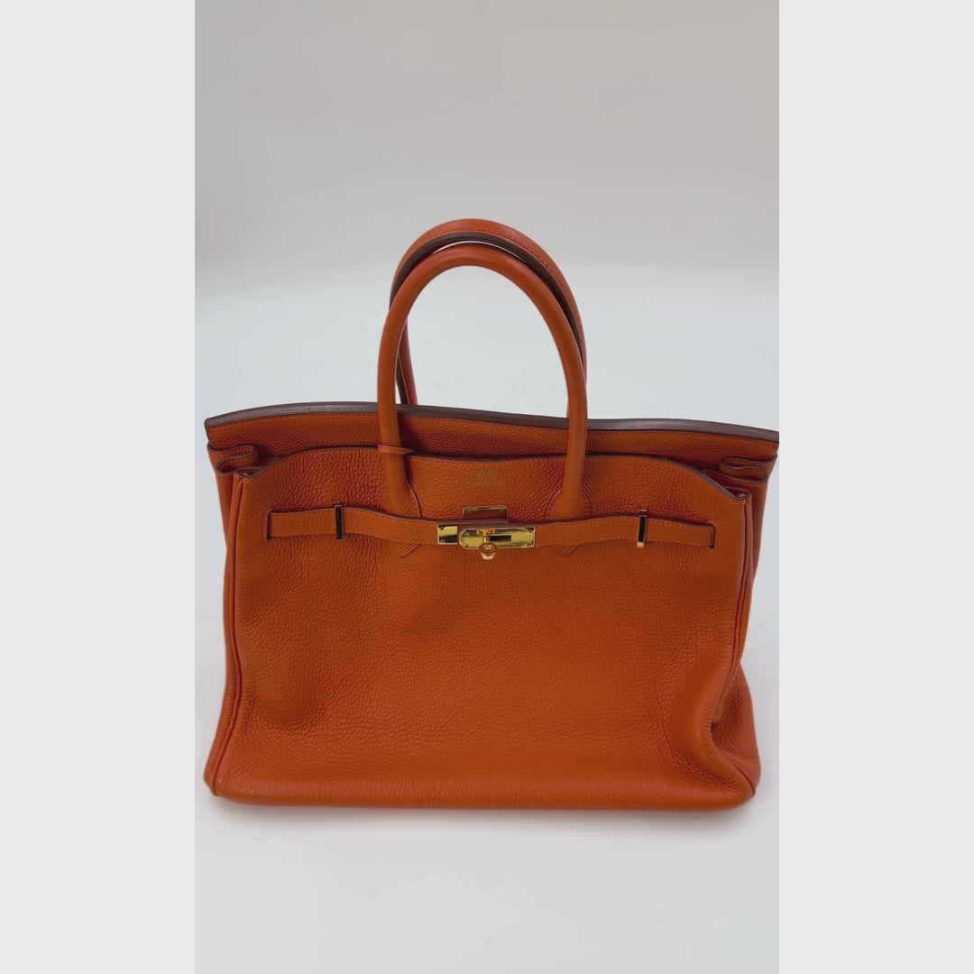Hermès Orange Clemence 35 Bag With Gold Hardware