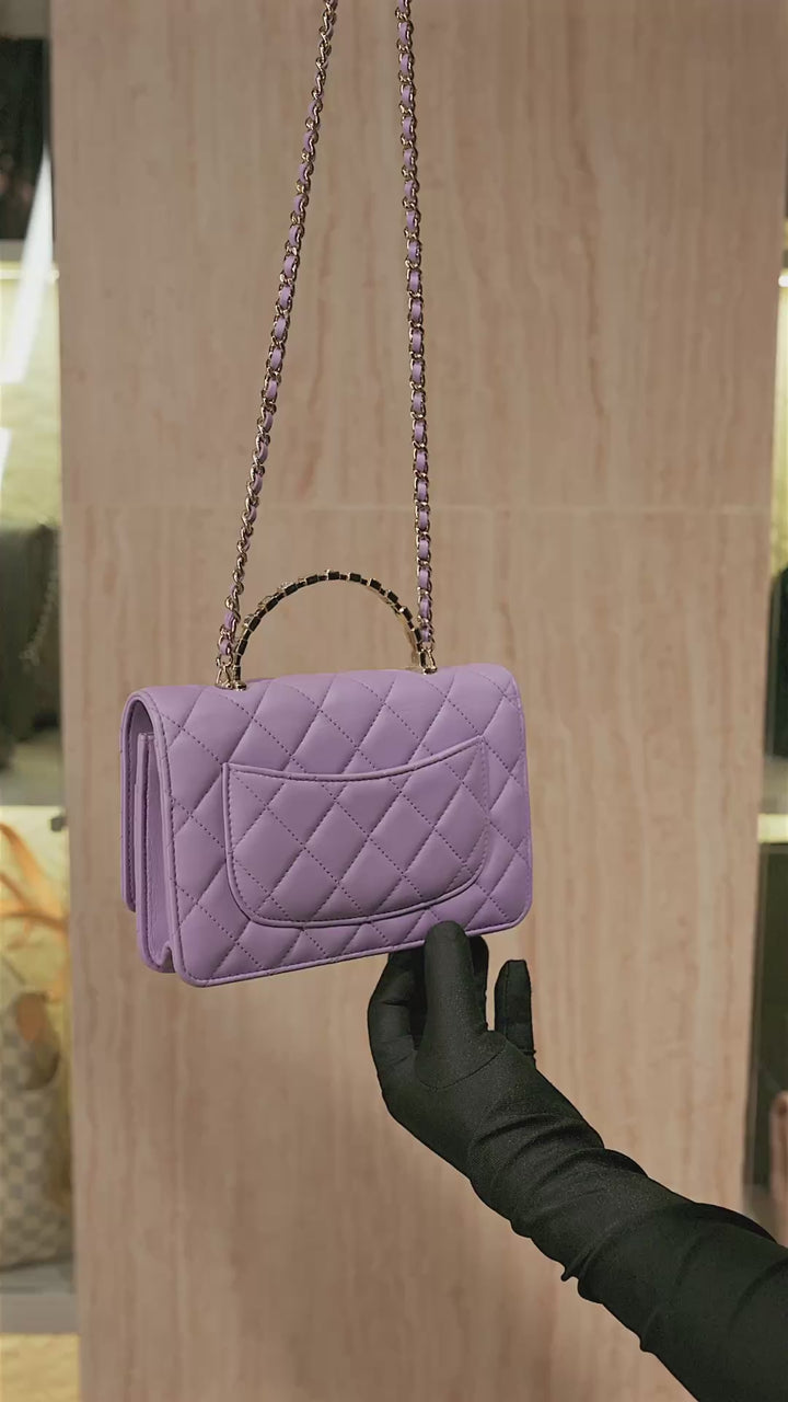 Chanel Mini Flap Bag With Handle in purple lambskin leather with champagne gold hardware