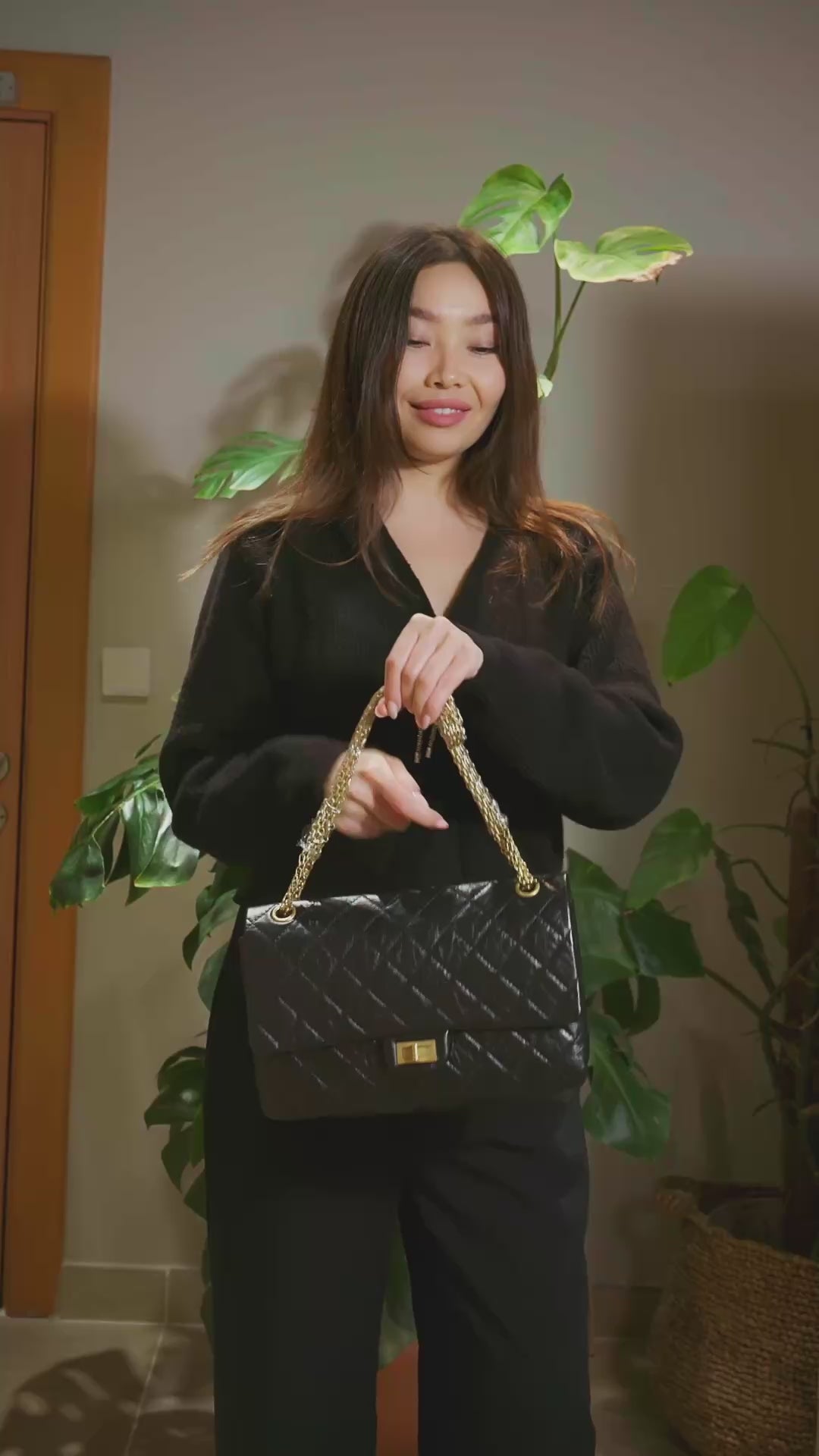 Chanel 2.55 Handbag in Black Aged Calfskin with Gold Tone Metal Hardware
